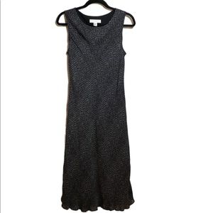 Petite Sophisticate, sleeveless black dress. 12P